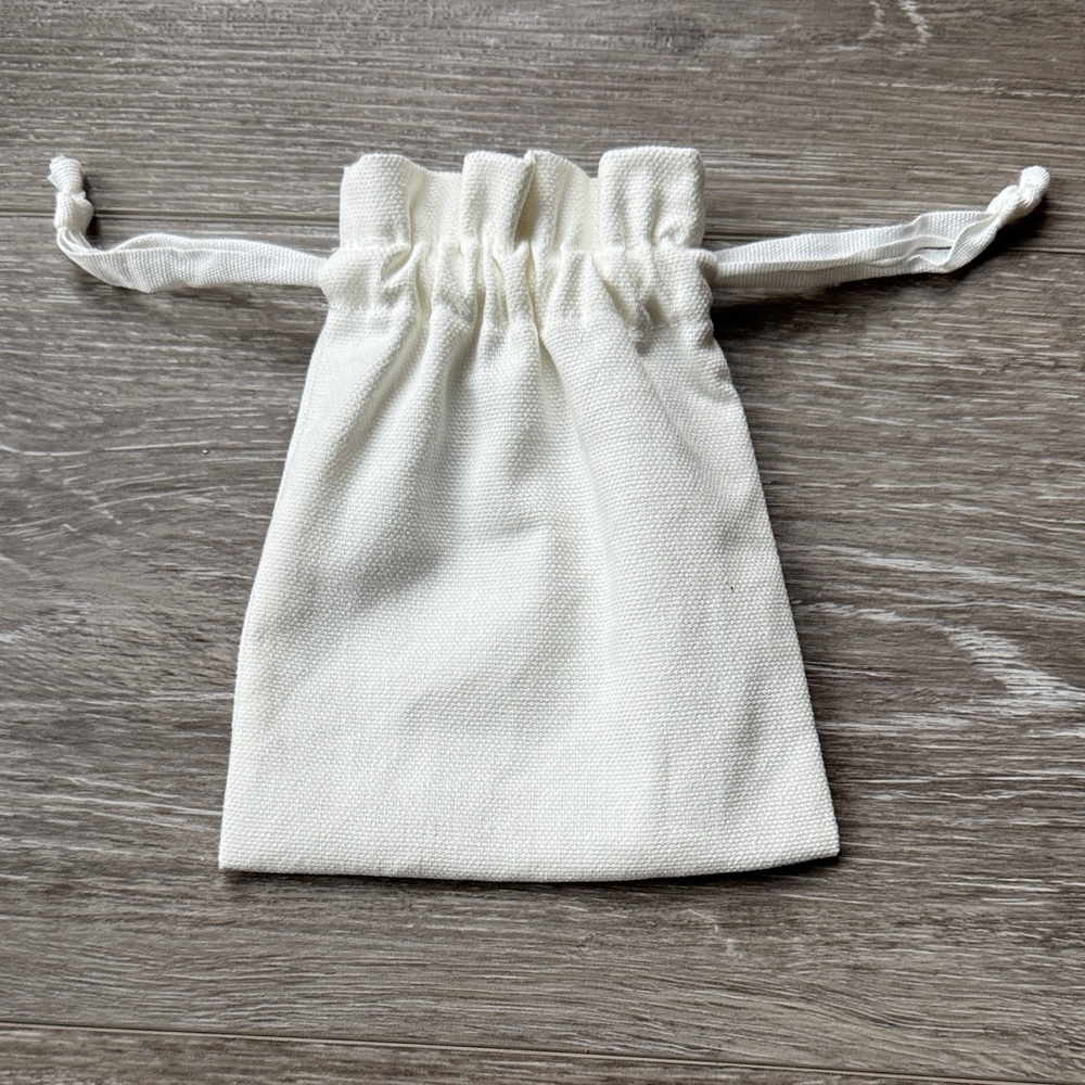 DIOR Cream Drawstring Bag with Gold Logo - Picture 2 of 3